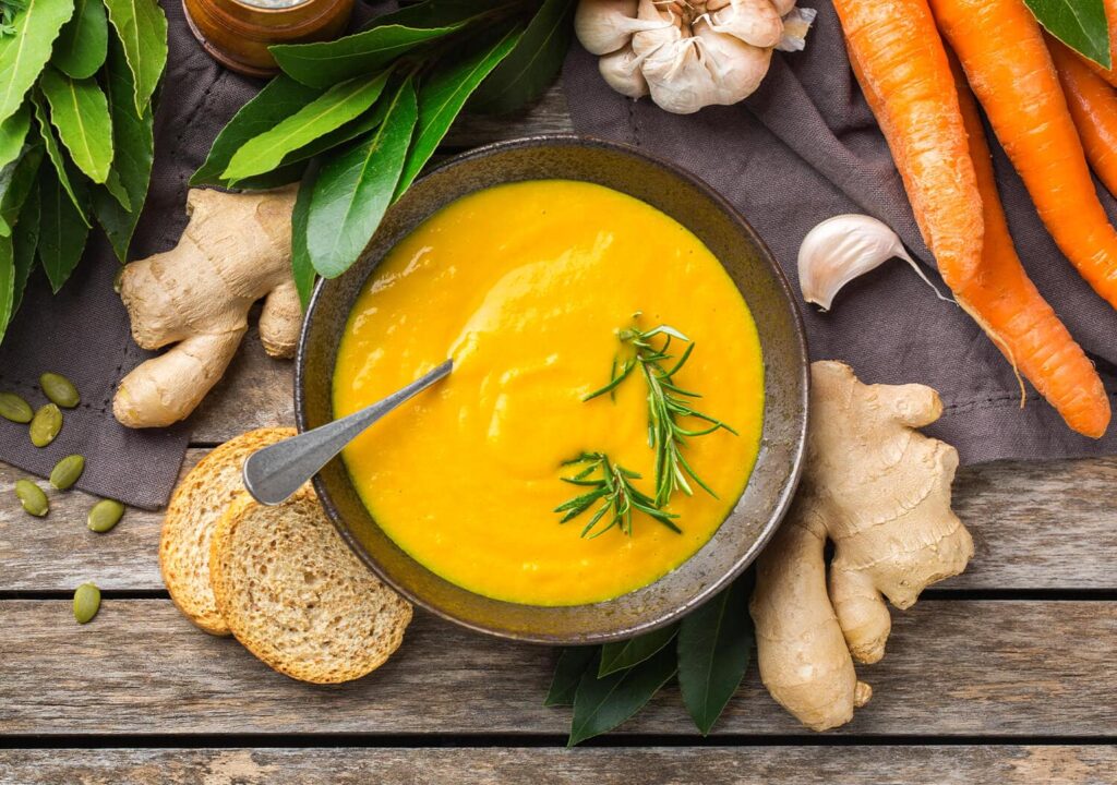 Golden Turmeric Soup with Fresh Veggies